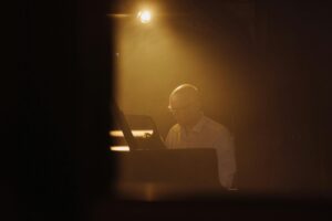 An Elderly Man Playing Piano